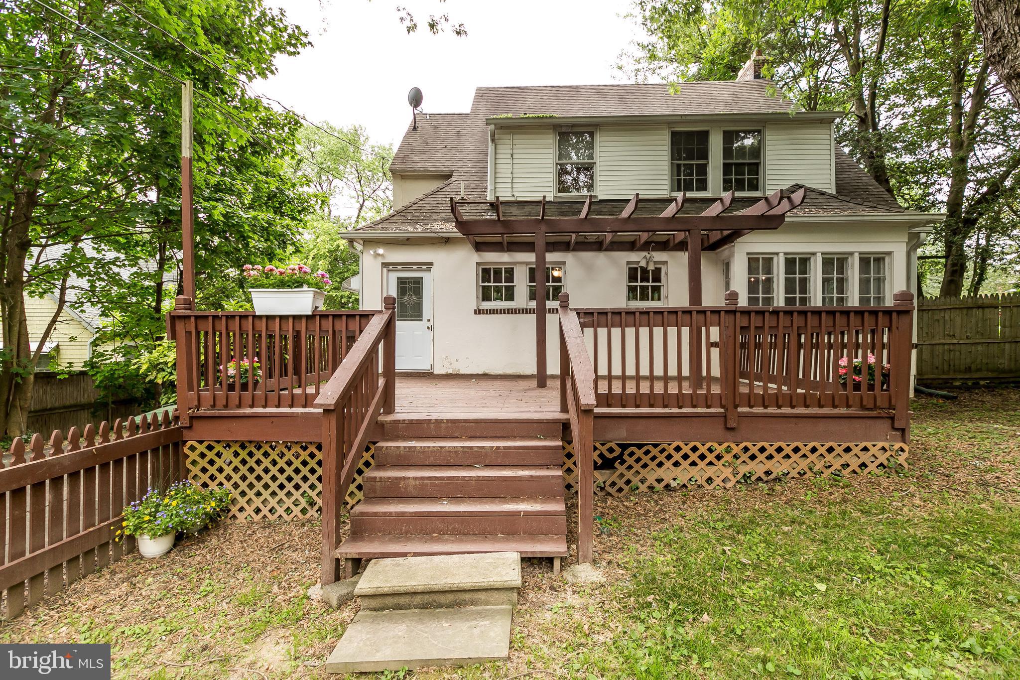 406 Hollen Road Baltimore, MD 21212 - Photo 38 of 43 A rear view of the home and the large deck