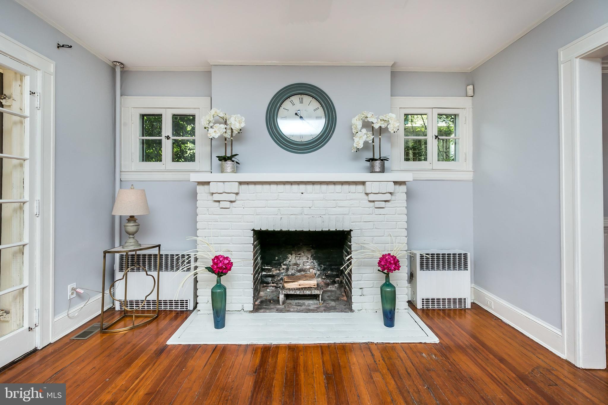 406 Hollen Road Baltimore, MD 21212 - Photo 9 of 43 Gorgeous wood-burning fireplace warms the room
