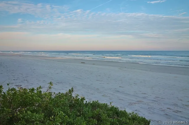 a view of an ocean from a beach