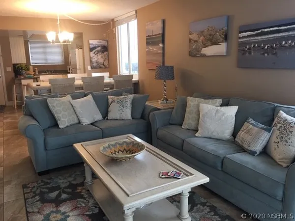 a living room with furniture and a couch