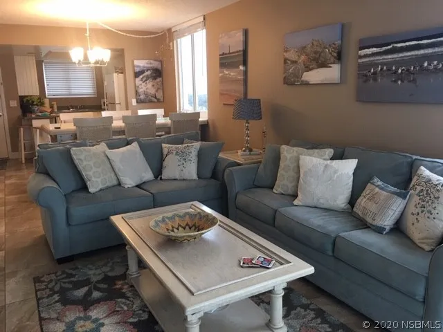 a living room with furniture and a couch