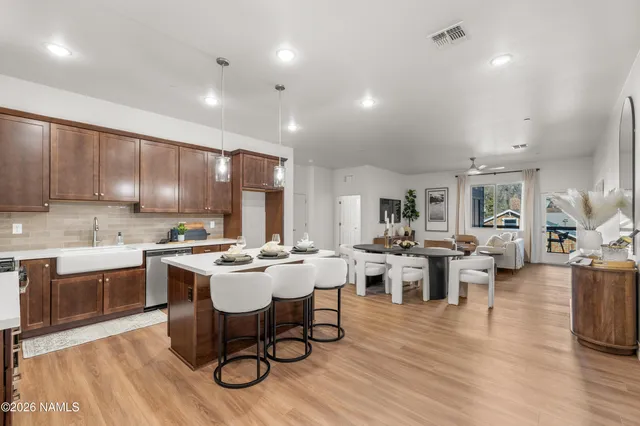 a kitchen with lots of counter top space and living room