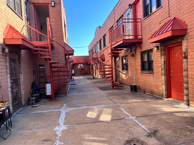 a view of a building with a street