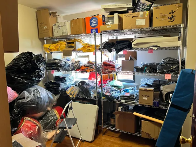 a room with lots of different colored cloths