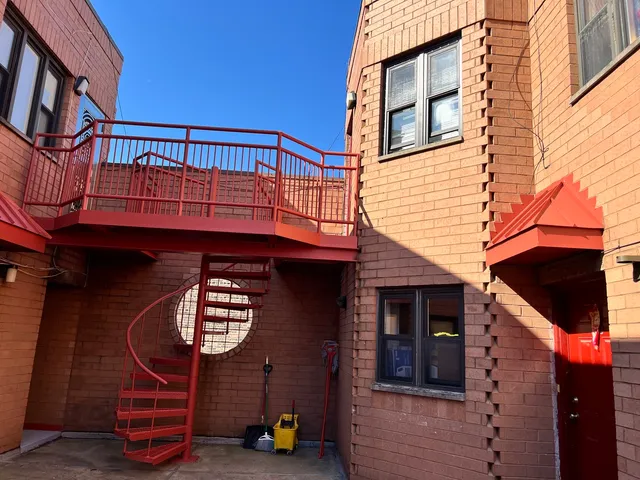 a front view of a house with parking