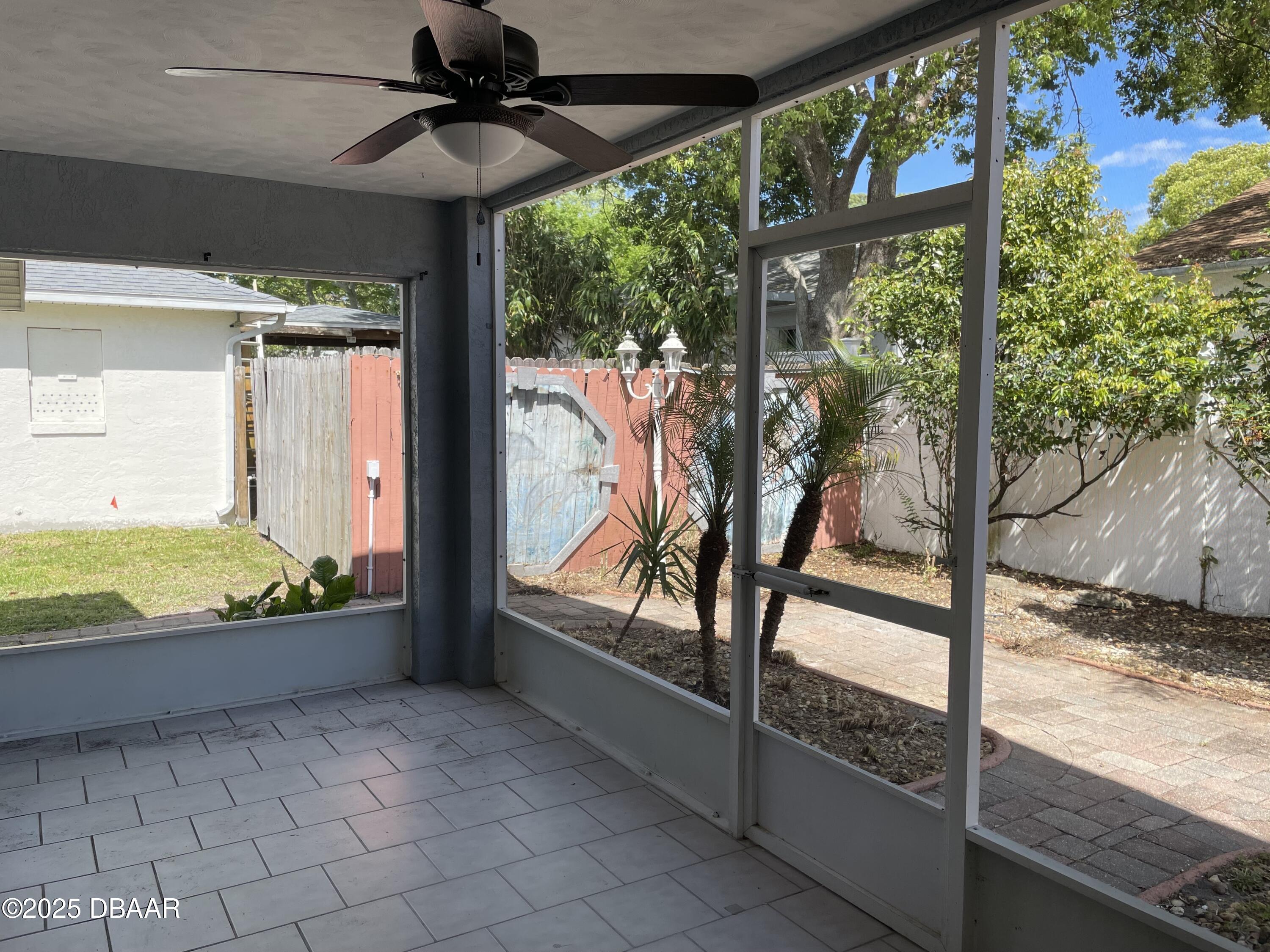 5426 Landis Avenue Port Orange, FL 32127 - Photo 26 of 30 a view of a porch and garden