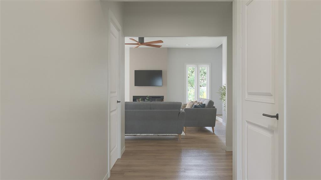 467 Lessie Circle Kennedale, TX 76060 - Photo 3 of 18 a view of a hallway view with wooden floor and a bathroom