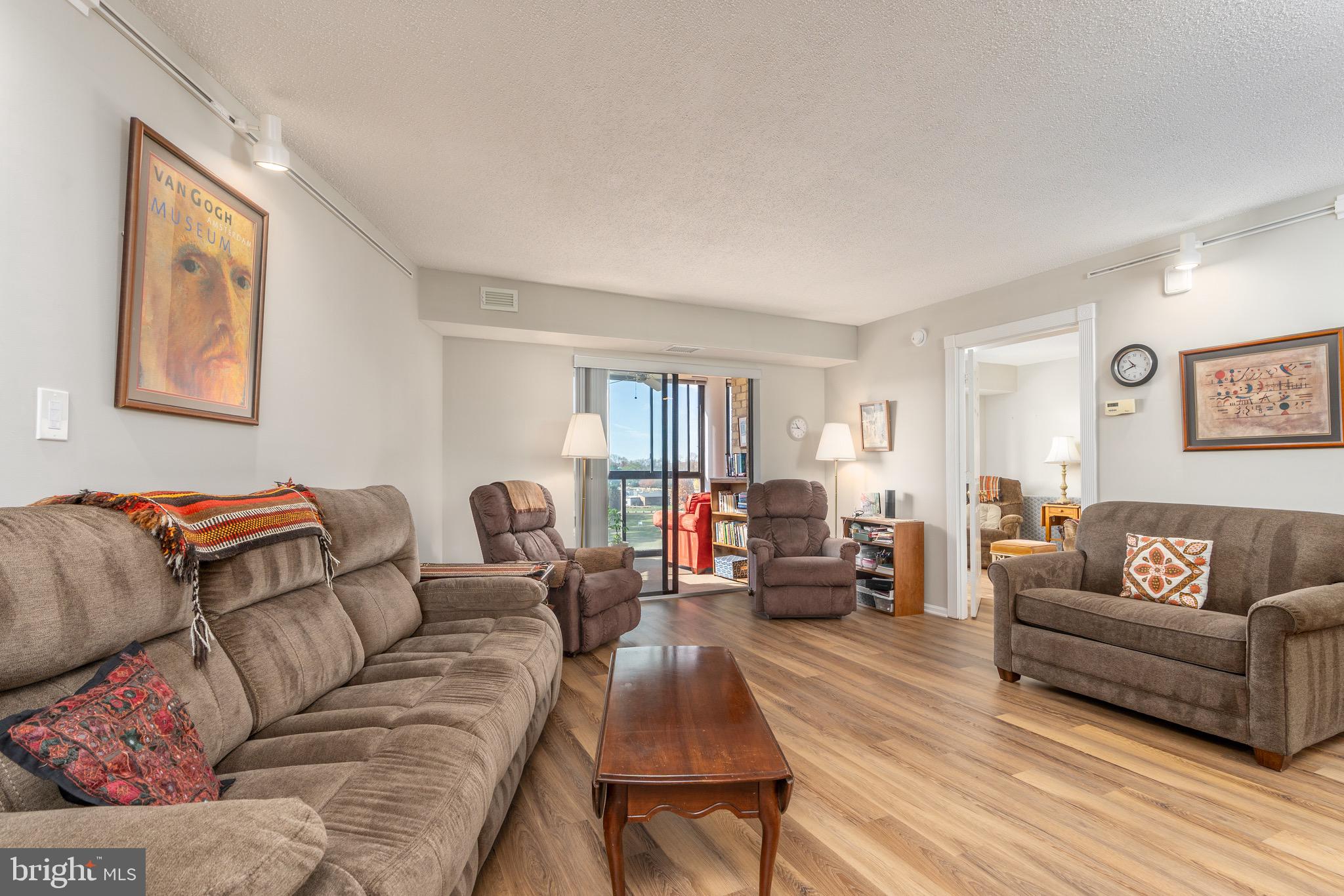 15101 Interlachen Drive, Unit 1612 Silver Spring, MD 20906 - Photo 16 of 37 Living Room with LVP flooring