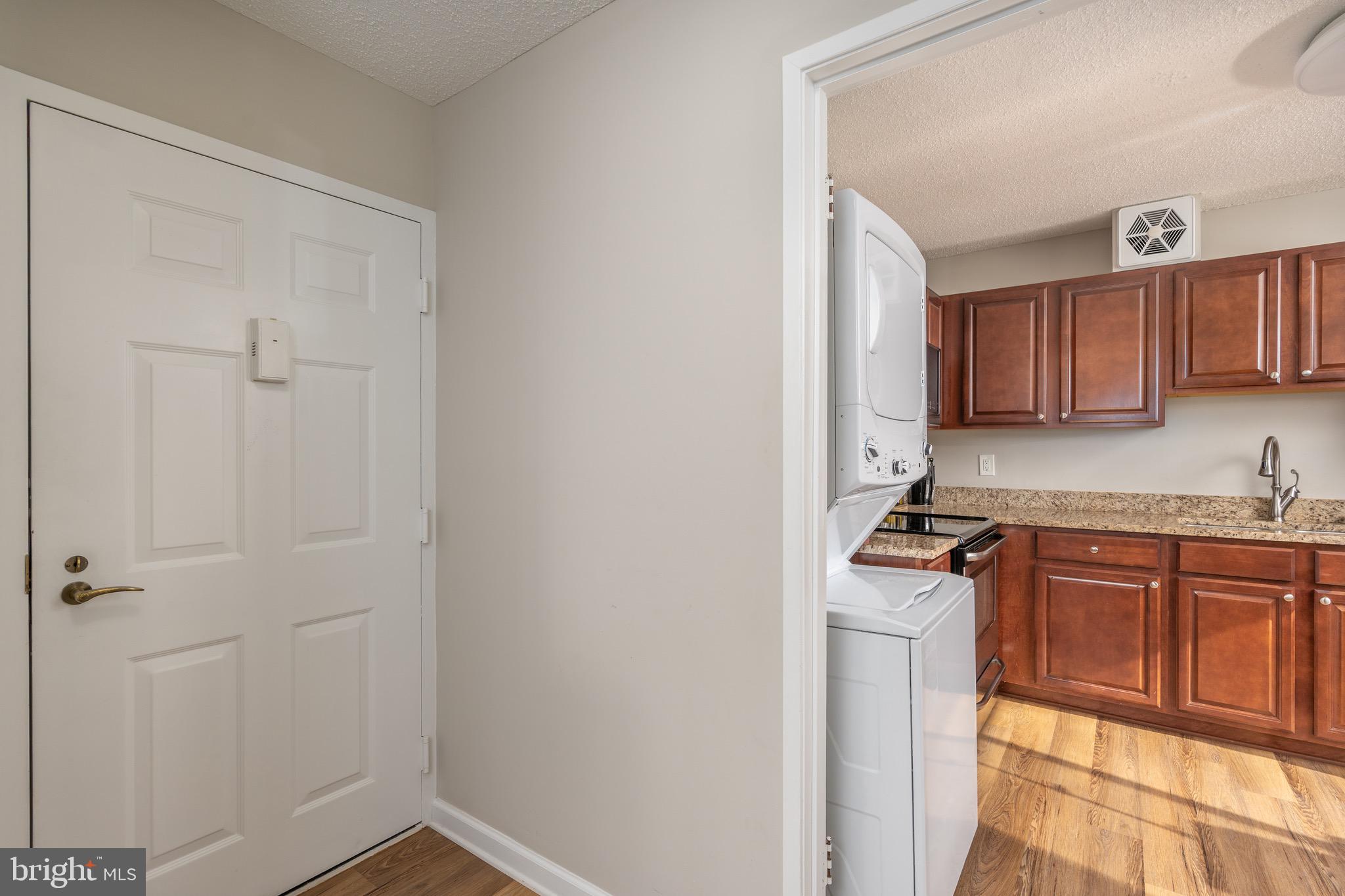 15101 Interlachen Drive, Unit 1612 Silver Spring, MD 20906 - Photo 6 of 37 Front door and easy access to kitchen