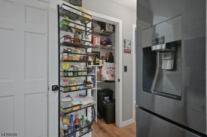 30 Eatontown Road West Milford, NJ 07421 - Photo 12 of 50 a kitchen with stainless steel appliances a refrigerator and a window