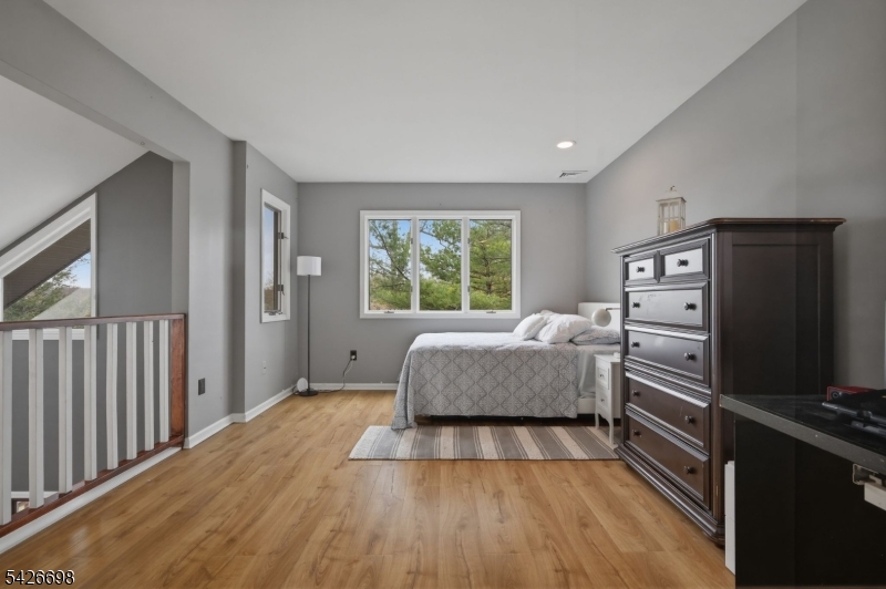 30 Eatontown Road West Milford, NJ 07421 - Photo 26 of 50 a spacious bedroom with a bed and a window