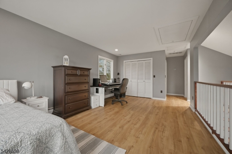 30 Eatontown Road West Milford, NJ 07421 - Photo 27 of 50 a bedroom with a bed and dresser