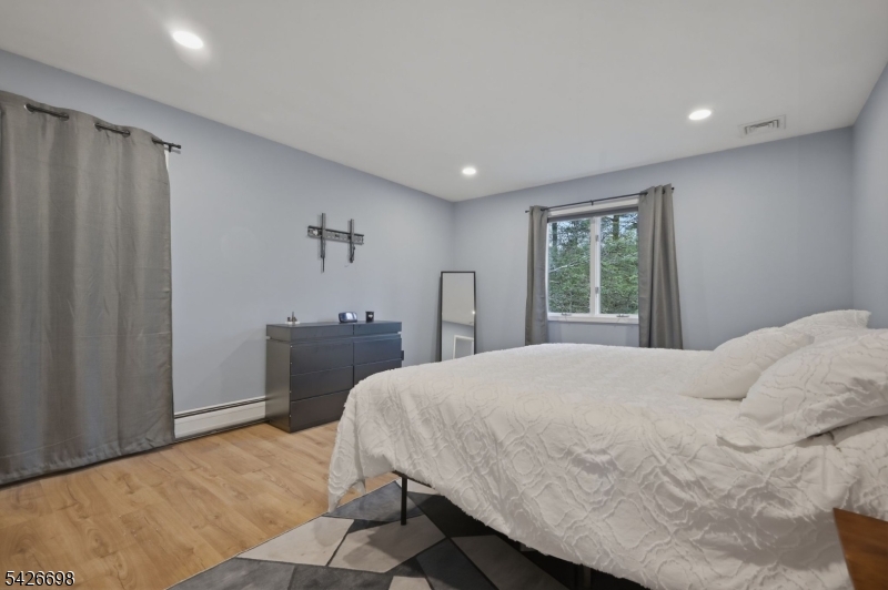 30 Eatontown Road West Milford, NJ 07421 - Photo 30 of 50 a bedroom with a bed and a window