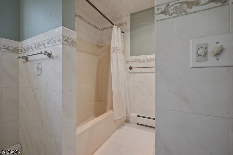 30 Eatontown Road West Milford, NJ 07421 - Photo 35 of 50 a bathroom with a shower