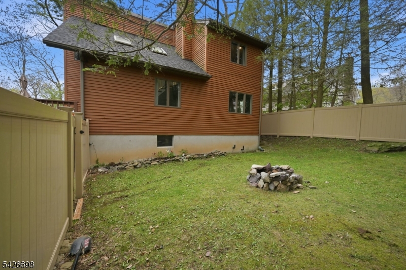 30 Eatontown Road West Milford, NJ 07421 - Photo 40 of 50 a backyard of a house with lots of green space