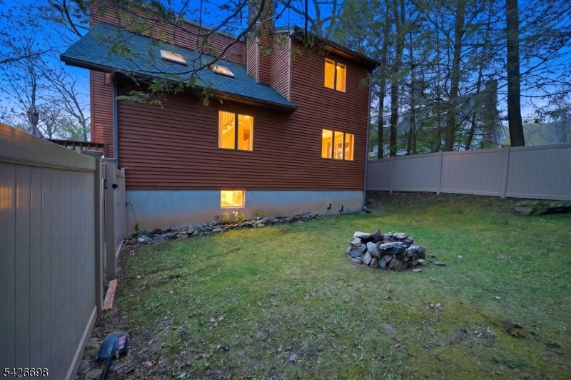30 Eatontown Road West Milford, NJ 07421 - Photo 41 of 50 a backyard of a house with lots of green space