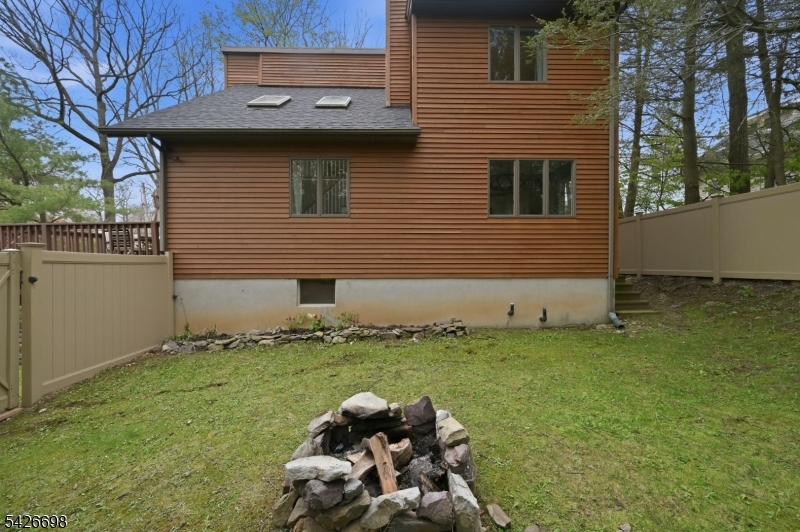 30 Eatontown Road West Milford, NJ 07421 - Photo 42 of 50 a backyard of a house with lots of green space