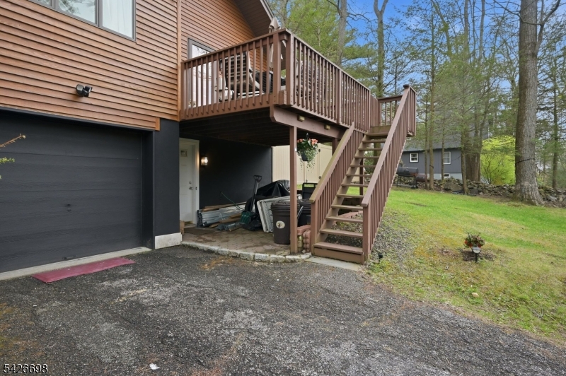 30 Eatontown Road West Milford, NJ 07421 - Photo 5 of 50 a view of a house with backyard and porch