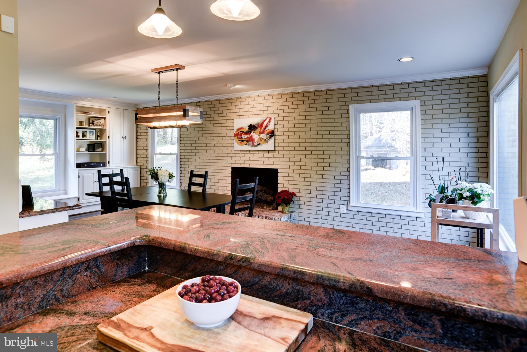 13629 Esworthy Road Germantown, MD 20874 - Photo 6 of 50 View into kitchen eat-in /family room w/fireplace