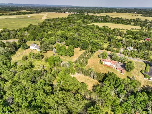 a view of an ocean and a houses