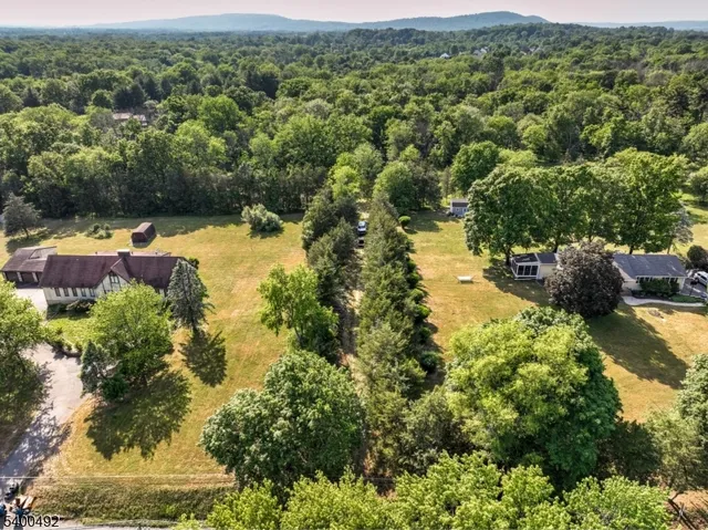 a view of a lake with mountains in the background
