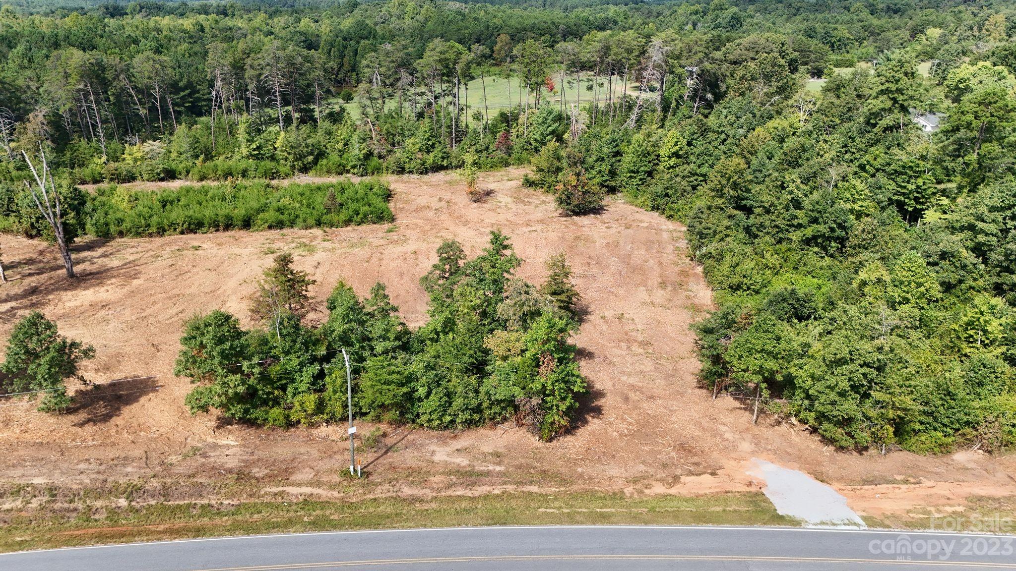 Lot 3 Poors Ford Road, Unit 3 Tryon, NC 28782 - Photo 7 of 34 a view of a yard with pathway
