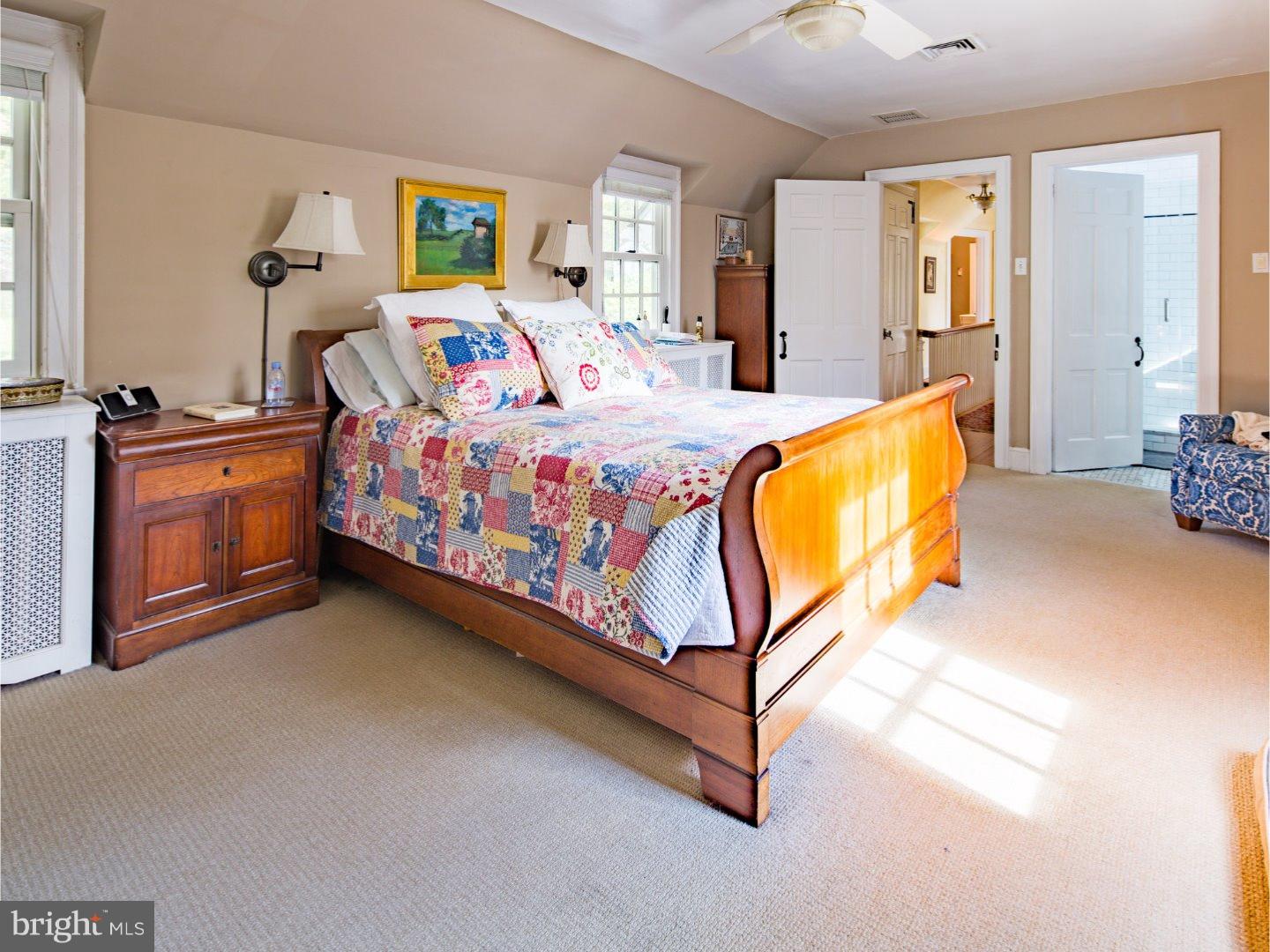 11 Forest Road Wayne, PA 19087 - Photo 17 of 25 a bed room with a bed and a couch