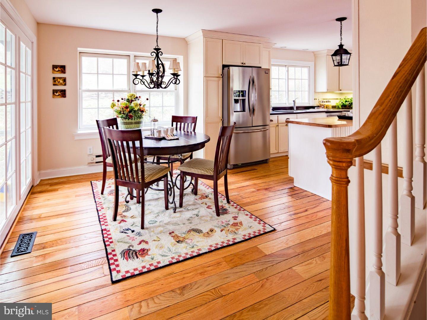 11 Forest Road Wayne, PA 19087 - Photo 9 of 25 a dining room filled with furniture and wooden floor