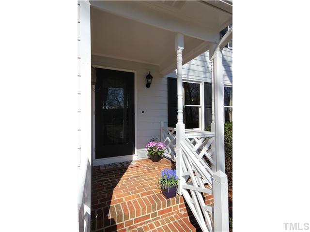 115 Brandywine Drive Raleigh, NC 27607 - Photo 3 of 25 a bed room with a bed and a chair