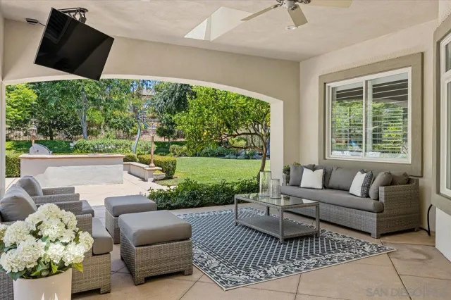a spacious bedroom with a bed and furniture