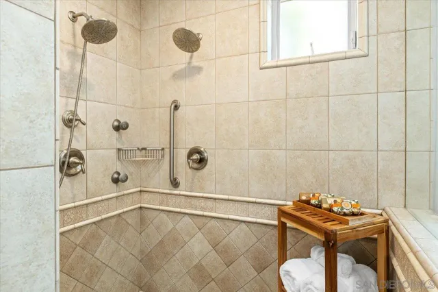 a kitchen with cabinets and window