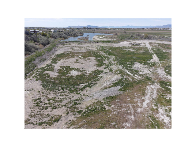 1090 East Factory Road Garland, UT 84312 - Photo 15 of 24 Bird's eye view of a water and mountain view