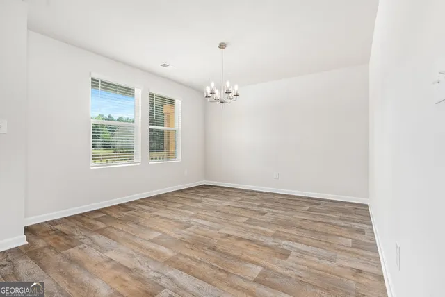 a view of a room with windows