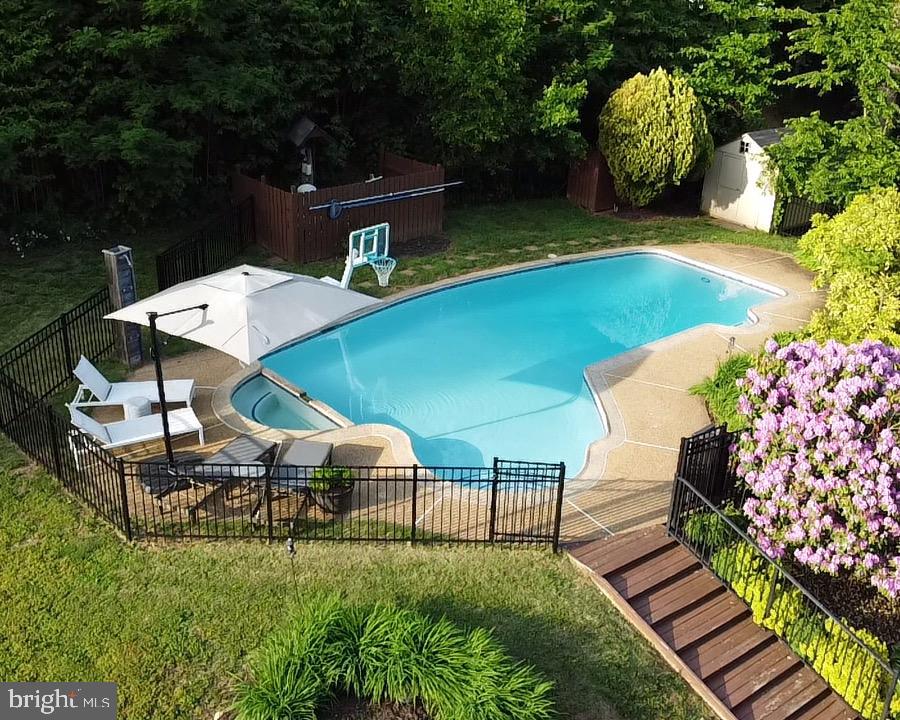 10946 Byrd Drive Fairfax, VA 22030 - Photo 1 of 39 a backyard of a house with table and chairs