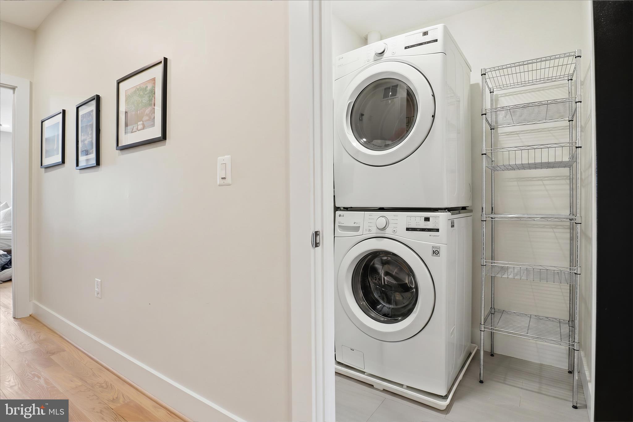 1222 Neal Street Northeast, Unit 3 Washington, DC 20002 - Photo 29 of 38 a utility room with dryer and washer