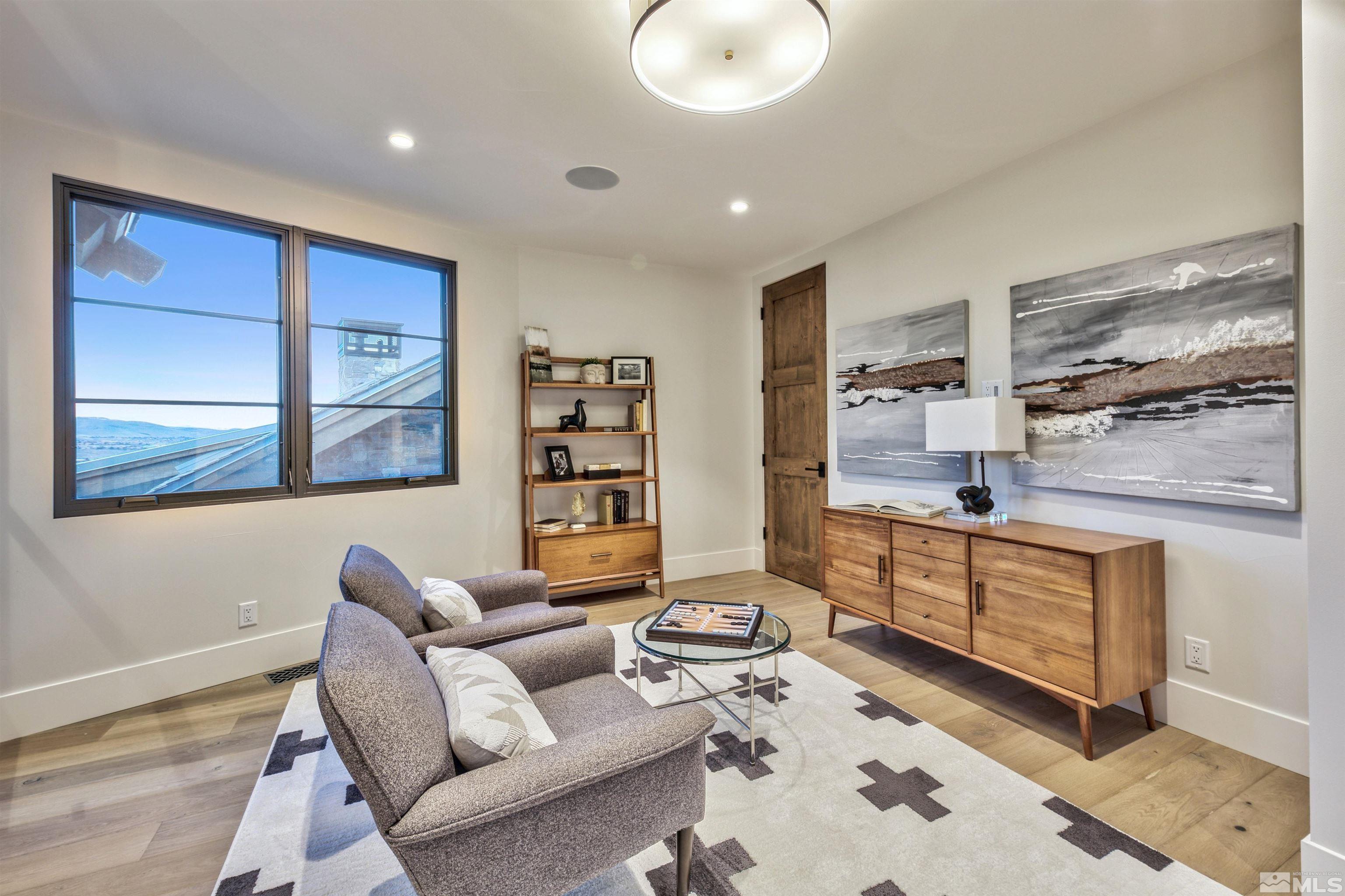 170 Hawken Road Reno, NV 89519 - Photo 20 of 26 a living room with furniture and a painting on the wall