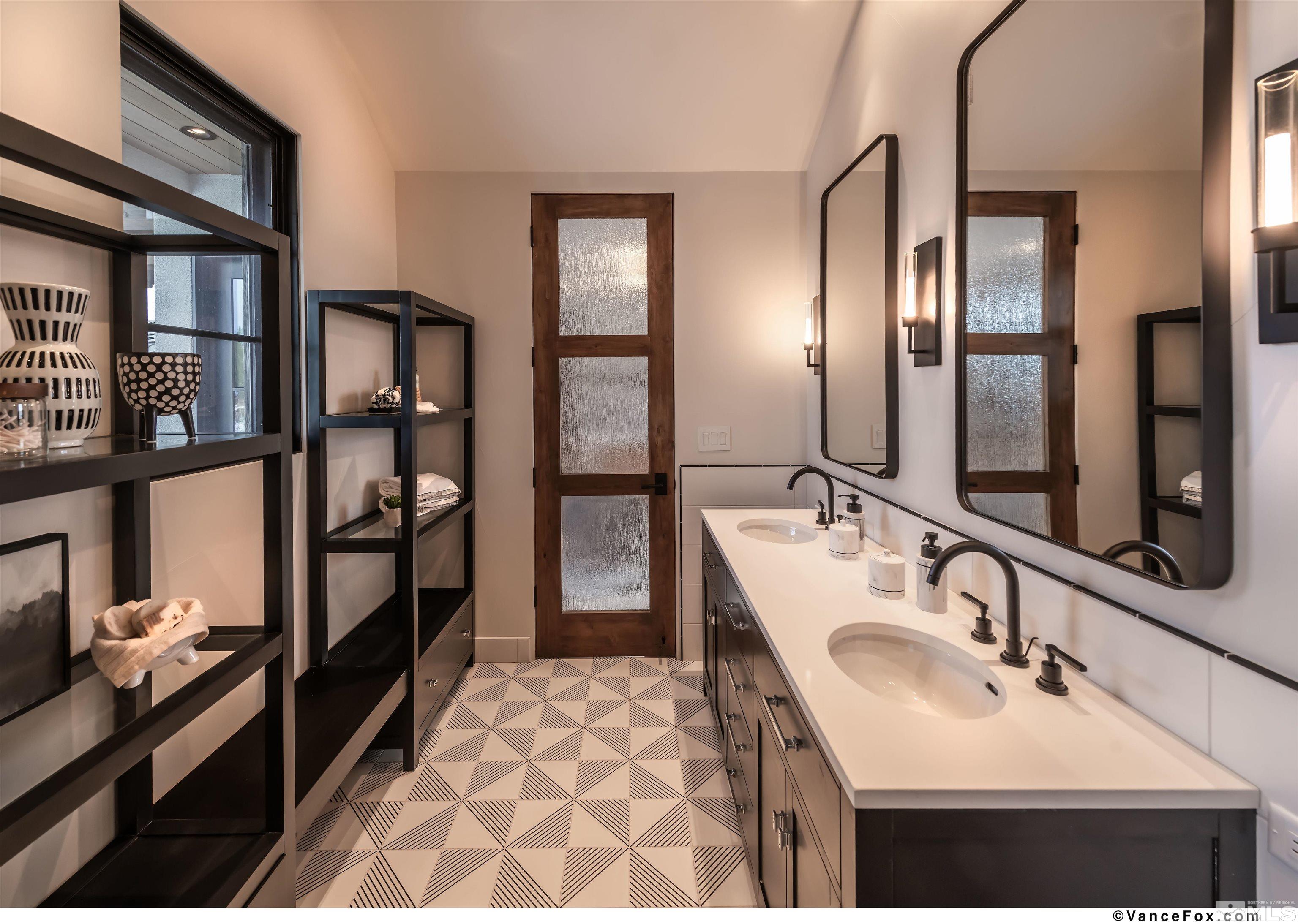 170 Hawken Road Reno, NV 89519 - Photo 22 of 26 a bathroom with a sink and a mirror