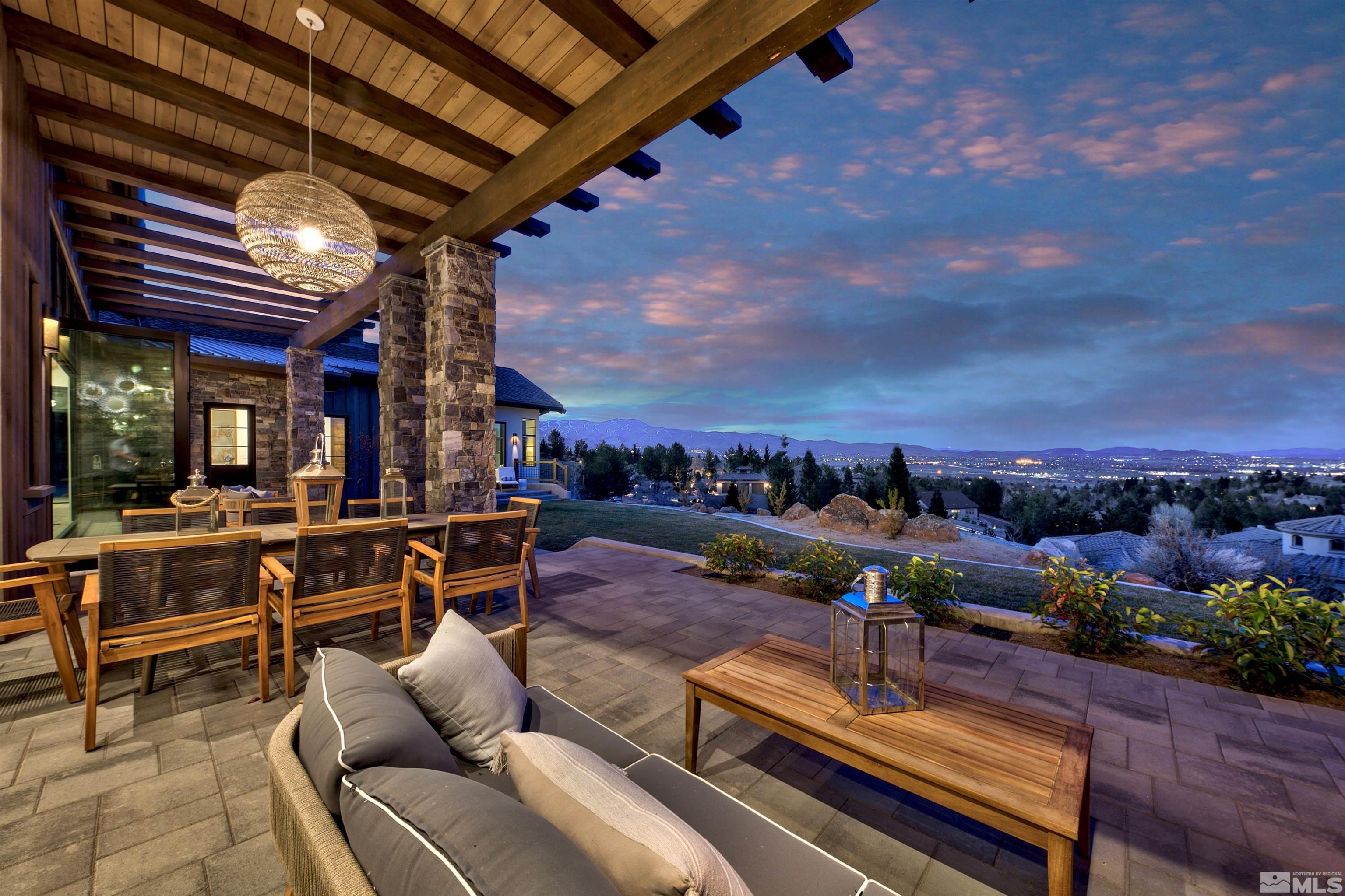170 Hawken Road Reno, NV 89519 - Photo 10 of 26 a view of a balcony with chairs and a potted plant
