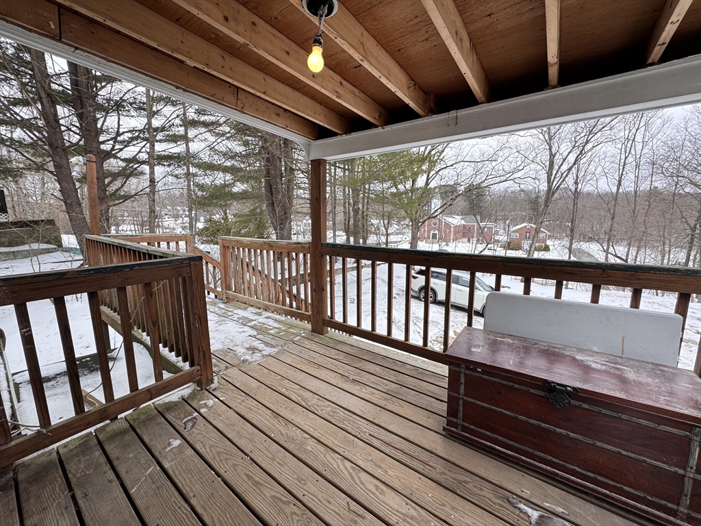 4 James Street, Unit 2 Dudley, MA 01571 - Photo 11 of 15 a view of wooden deck