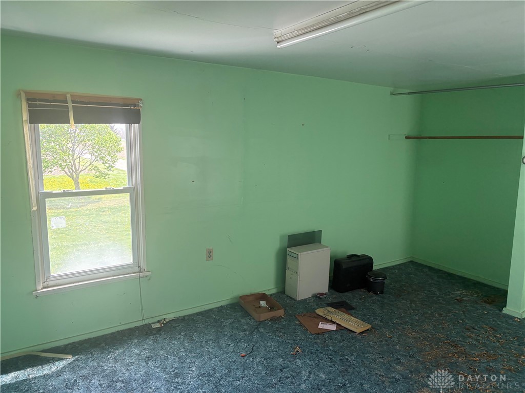 9006 Oakes Road Arcanum, OH 45304 - Photo 28 of 29 This spacious room offers potential with a bright window overlooking a green landscape.