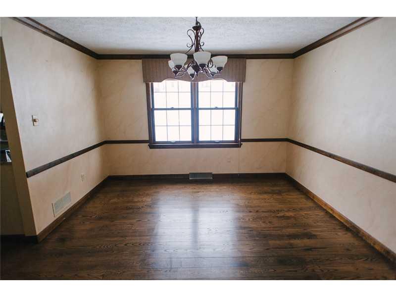 111 Thomas Road Canonsburg, PA 15317 - Photo 4 of 25 Dining Room. Notice the crown molding and updated light fixture.