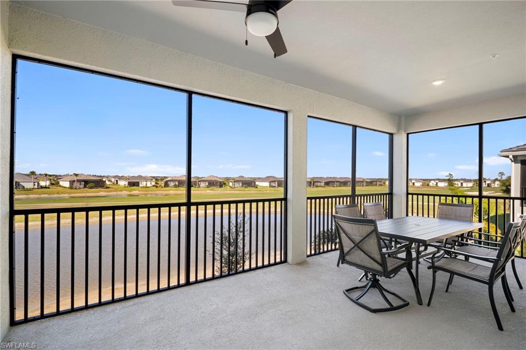 15194 Bluffton Lane, Unit 1422 Babcock Ranch, FL 33982 - Photo 1 of 35 a balcony with chairs