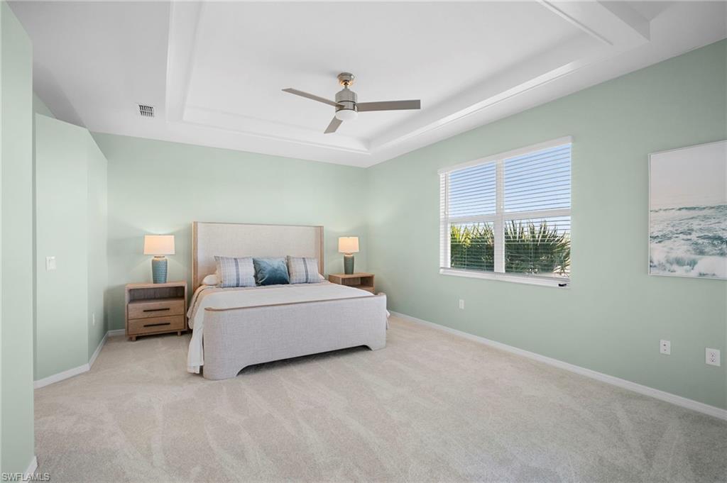 15194 Bluffton Lane, Unit 1422 Babcock Ranch, FL 33982 - Photo 22 of 35 a living room with furniture and a window