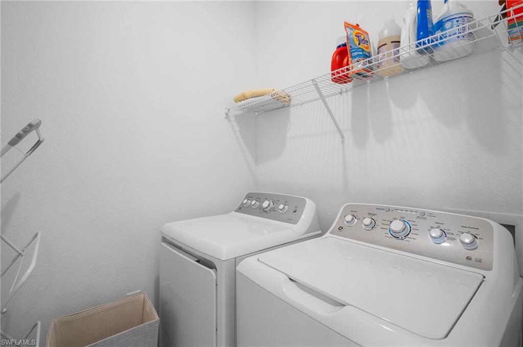 15194 Bluffton Lane, Unit 1422 Babcock Ranch, FL 33982 - Photo 30 of 35 a utility room with dryer and washer