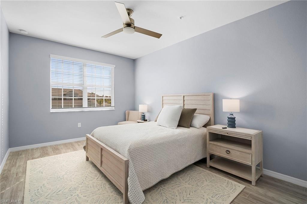 15194 Bluffton Lane, Unit 1422 Babcock Ranch, FL 33982 - Photo 33 of 35 a bedroom with a bed and a window