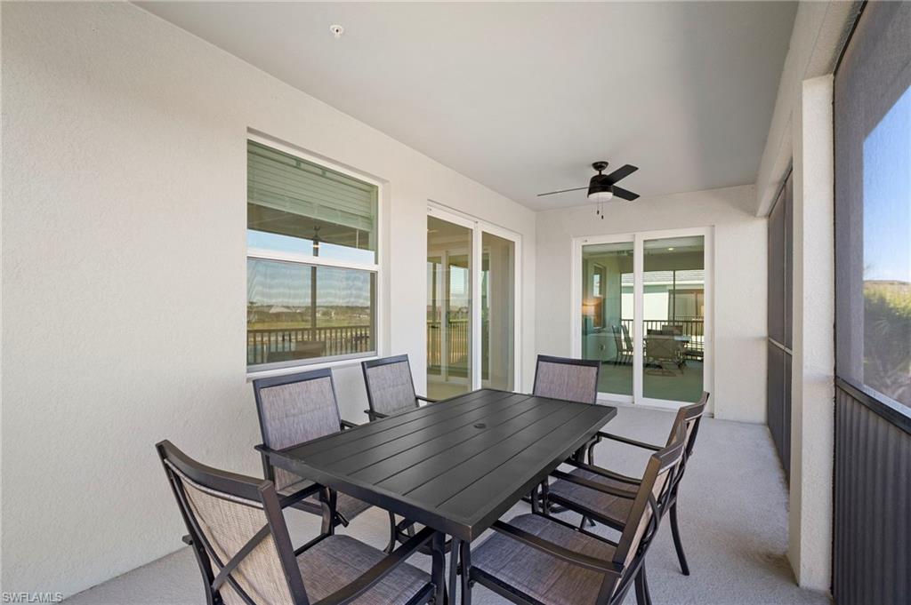 15194 Bluffton Lane, Unit 1422 Babcock Ranch, FL 33982 - Photo 35 of 35 a view of a dining room with furniture window and outside view