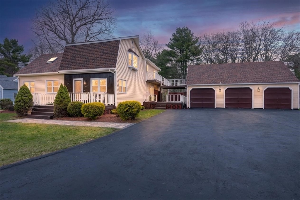 17 Weaver Street Wareham, MA 02576 - Photo 1 of 37 a front view of house with yard and trees in the background