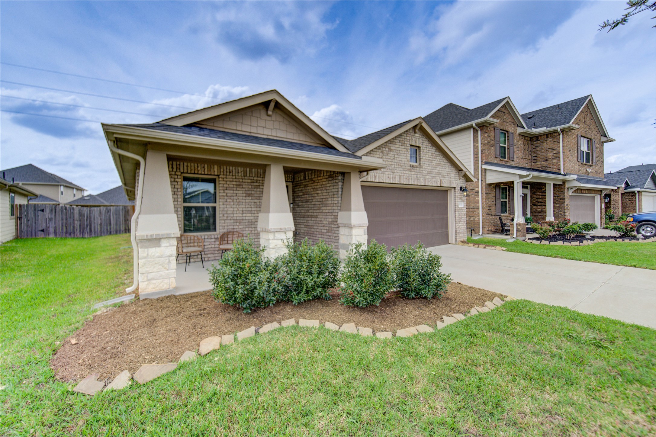 5011 Yellow Rays Trail Katy, TX 77493 - Photo 2 of 47 a front view of a house with garden