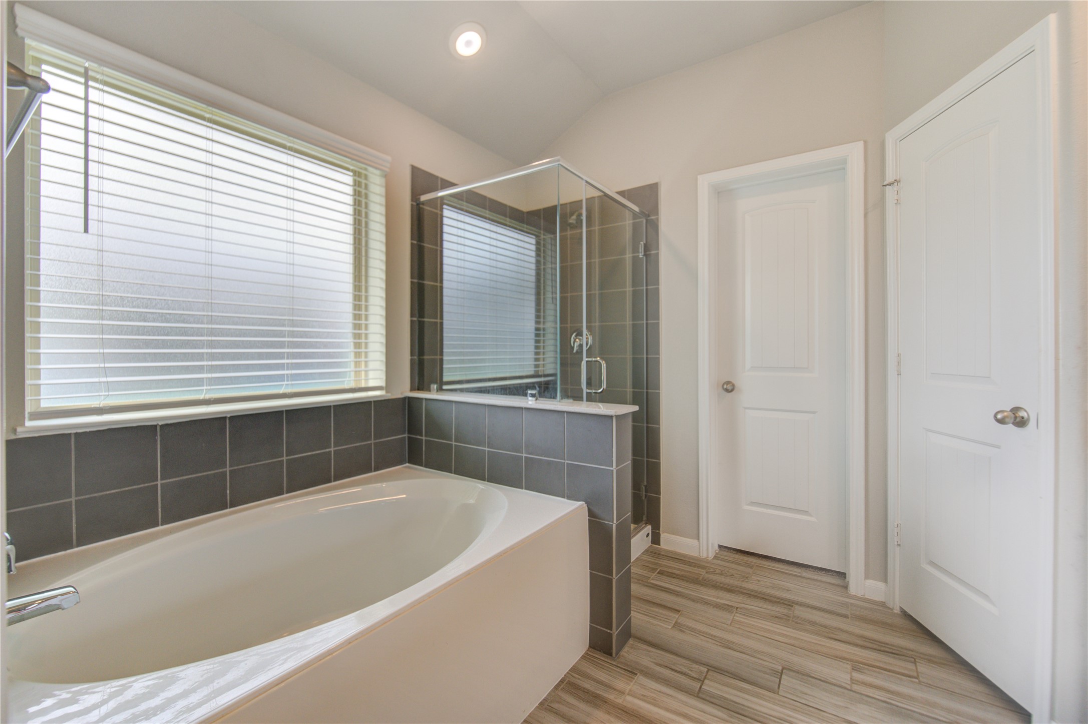 5011 Yellow Rays Trail Katy, TX 77493 - Photo 26 of 47 a bathroom with a bathtub and a shower