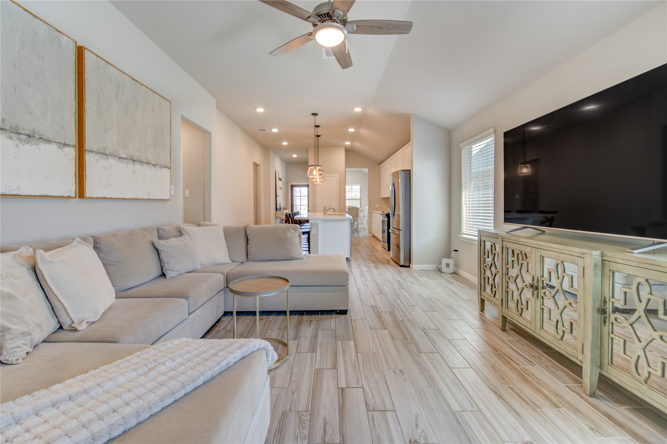 5011 Yellow Rays Trail Katy, TX 77493 - Photo 3 of 47 a living room with furniture and a flat screen tv